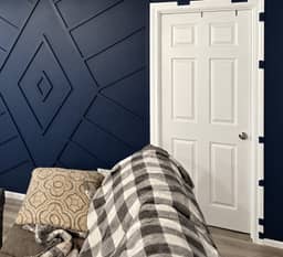 Navy geometric trim accent wall built by Major Premium