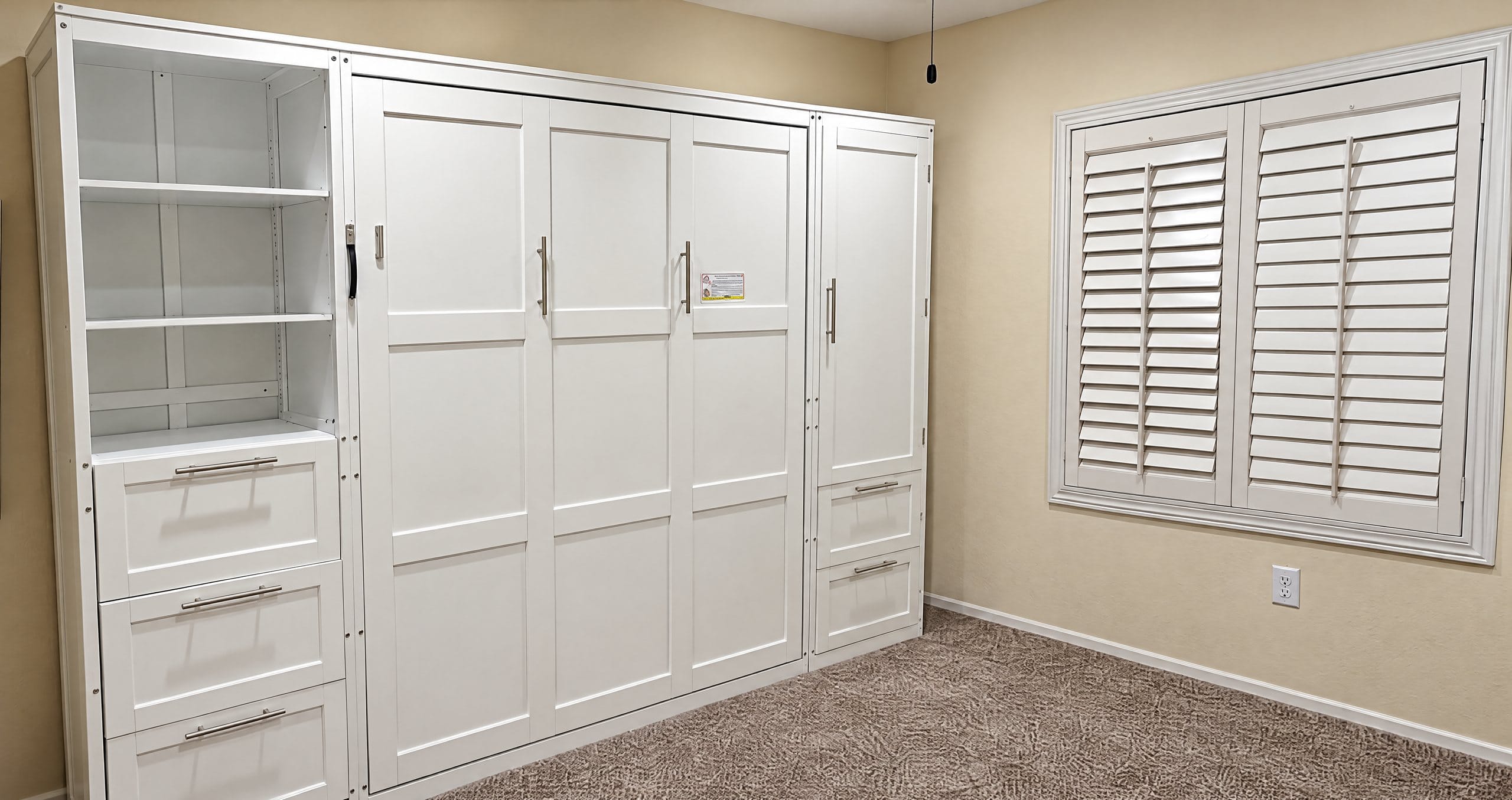 Wall bed closed into its cabinet