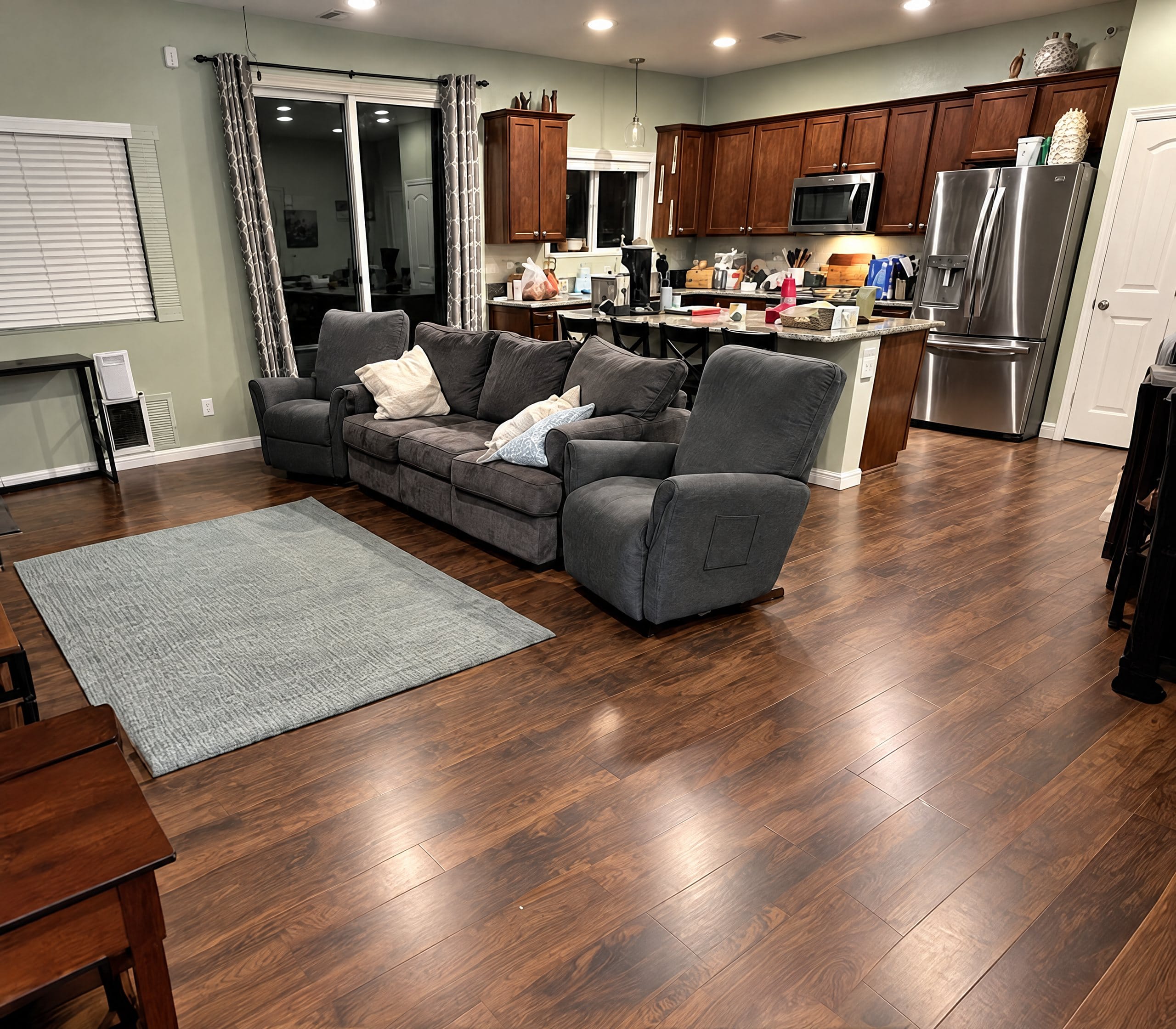 Living room with new dark plank flooring